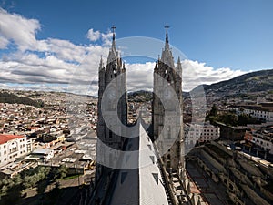 Panorama view of two gothic cathedral church towers of Basilica del Voto Nacional in Quito old historic centre Ecuador