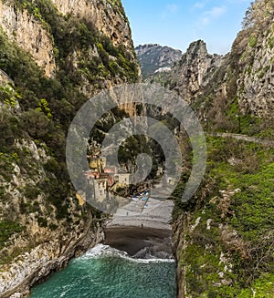 A panorama view up the fjord at Fiordo di Furore on the Amalfi Coast, Italy on a sunny day photo