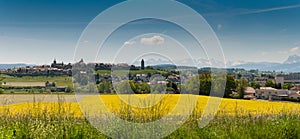 Panorama view of the village of Romont in Switzerland with the Alps in the background