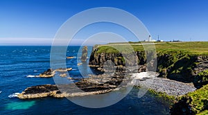 Panorama view of the wild Caithness coast and the Noss Head Lighthouse
