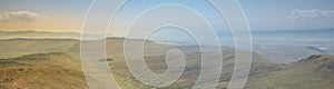 Panorama view of wild landscape with mountains, river and meadows - Scotland