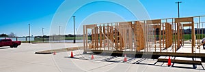 Panorama view wooden mobile home residential manufactured housing prefab house under construction framing at large outdoor parking