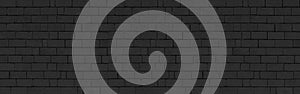 Vintage black stone brick wall pattern and background seamless