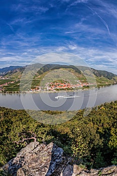 Panorama of Wachau valley Unesco world heritage site with ship on Danube river against Duernstein village in Lower Austria,