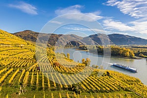 Panorama of Wachau valley (Unesco world heritage site) with ship on Danube river, Weissenkirchen in Austria