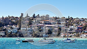 Panorama of Watsons Bay Australia as seen form the sea with sailing boats in the front