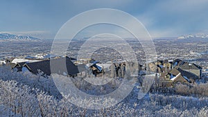 Panorama Whispy white clouds High angle view of Draper residential area in Utah