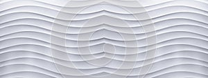 Panorama of white concrete wall with a wave line pattern