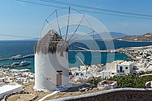 Panorama with white windmill and island of Mykonos, Greece