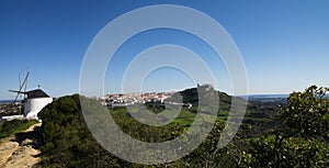 Panorama of wind mill and Palmela under blue sky. Portugal photo