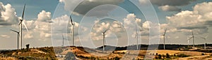 panorama wind turbine on hill. energy power in nature. eco concept