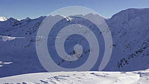 Panorama of Winter alps mountains landscape in beautiful sunny day in frozen snowy nature