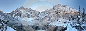 Panorama winter mountains. Scenery winter. Beautiful frosty and snowy nature. Ice mountain lake. winter landscape. Panoramic view