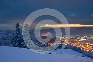 Panorama winter old City. Banska Stiavnica, Slovakia. Church at the top of the hill.