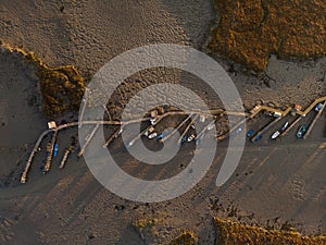 Panorama of wooden pier on stilts boat dock wharf port harbour Cais Palafitico da Carrasqueira Setubal Alentejo Portugal