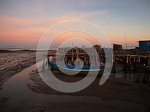 Panorama of wooden pier on stilts boat dock wharf port harbour Cais Palafitico da Carrasqueira Setubal Alentejo Portugal