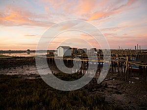 Panorama of wooden pier on stilts boat dock wharf port harbour Cais Palafitico da Carrasqueira Setubal Alentejo Portugal