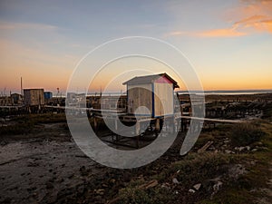 Panorama of wooden pier on stilts boat dock wharf port harbour Cais Palafitico da Carrasqueira Setubal Alentejo Portugal