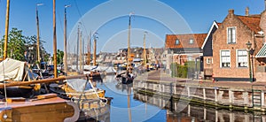 Panorama of wooden ships in the historic harbor of Spakenburg