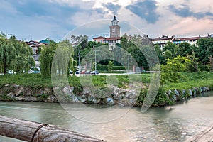 Panoramas of the city of Busca during sunset and in the blue hour photo