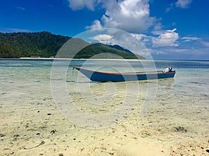 Panoramatic view of Kri island, boat on the beach photo