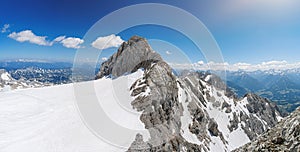 Panoramatic view from peak of Dachstein am Ramsau mountain in Alps in Austria.