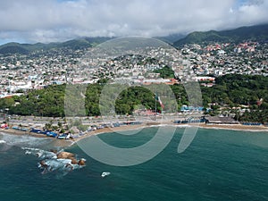 Acapulco Bay Aerial View with Mexican big Flag from above