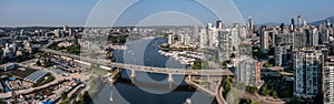 panoramic aerial city view of the areas left and right the famous False Creek in Vancouver downtown with Cambie Bridge