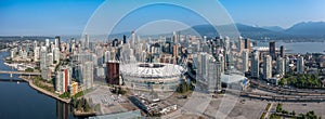 panoramic aerial city view of famous False Creek in Vancouver downtown with Cambie Bridge and BC Place Stadium