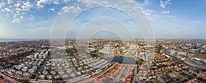 Panoramic aerial drone photography of Talatona city in Belas, residential area with condominiums with luxury houses and luxury