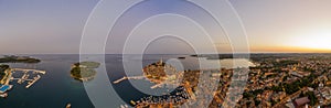 Panoramic aerial drone picture of the historic city Rovinj in Croatia during sunrise
