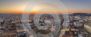 Panoramic Aerial drone shot of Jozsef Nador Square at dawn in Budapest downtown