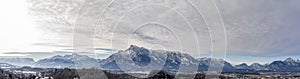 Panoramic aerial drone shot view of Austrian Alps snowy untersberg