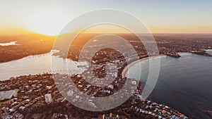 Panoramic aerial drone sunset view of Manly, an affluent seaside suburb of Sydney, New South Wales, Australia. photo