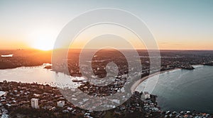 Panoramic aerial drone sunset view of Manly, an affluent seaside suburb of Sydney, New South Wales, Australia. photo