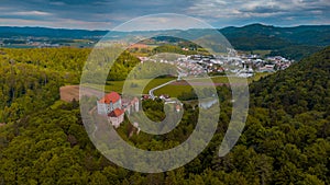 Panoramic aerial drone view of castle of Mirna on a summer day. Picturesque castle in dolenjska region of Slovenia photo