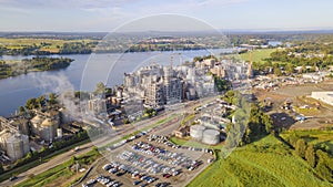 Panoramic aerial drone view of a large industrial grain mill at Bomaderry in the City of Shoalhaven, NSW, Australia