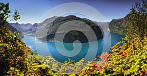 Panoramic aerial landscape of Geiranger fjord in Norway from mountain viewpoint. High resolution panorama