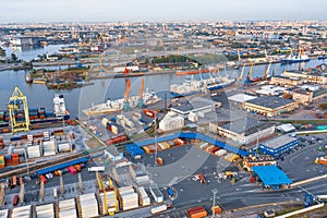 Panoramic aerial top view from the heights of the cityscape port harbor and industrial area of the city, with a tightly connected