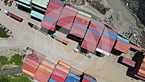 Panoramic aerial top view from the heights of the industrial area, container warehouse system network leading