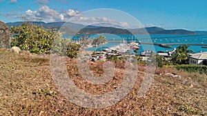 Panoramic aerial view of Airlie Beach skyline and Marina, Australia