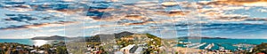 Panoramic aerial view of Airlie Beach skyline and Marina, Australia