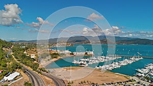 Panoramic aerial view of Airlie Beach skyline and Marina, Australia