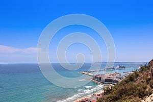 Panoramic aerial view at Alicante coasline and port, Spain photo