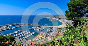 Panoramic aerial view of Blanes in Costa Brava in a beautiful summer day, Spain.