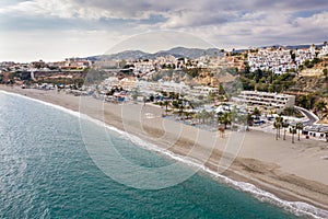 Panoramic aerial view of Burriana beach situated in Nerja Village , Malaga - Spain. photo