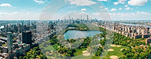 Panoramic aerial view of the Central Park in Manhattan, New York City surrounded by skyscrapers