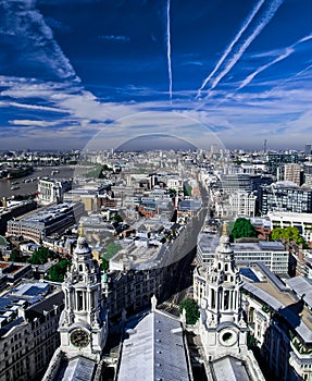 Panoramic aerial view of The City of London with River Thames, St. Paul`s cathedral and modern office buildings in London