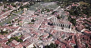 Panoramic aerial view of Condom city on Baise river on sunny summer day, Gers, France