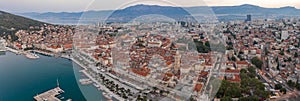 Panoramic aerial view of Diocletian Palace in empty Split old town by riva before sunrise in croatia summer